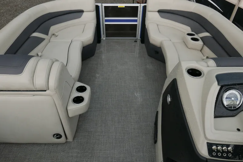 Slide: The Image of 2023 Barletta Cabrio 22UC pontoon boat interior with plush seating and cup holders. - 7