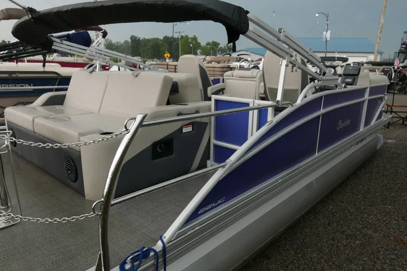 Slide: The Image of 2023 Barletta Cabrio 22UC pontoon boat with sleek design and comfortable seating. - 3