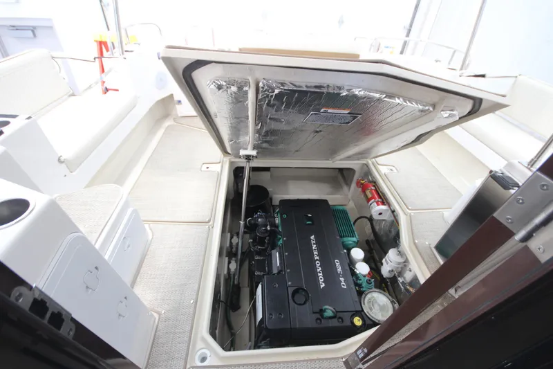 Slide: The Image of Engine compartment of 2026 Ranger Tugs R-31 CB with Volvo Penta D4-320 engine. - 16