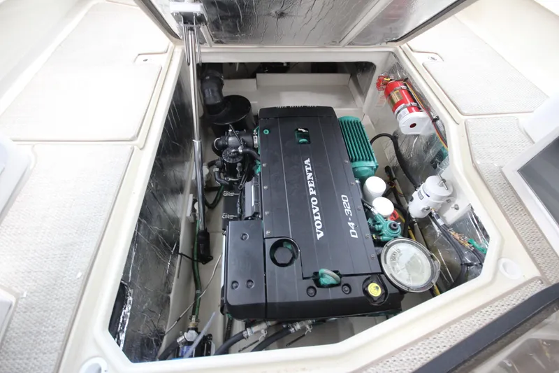 Slide: The Image of Engine compartment of 2026 Ranger Tugs R-31 CB with Volvo Penta D4-320 engine. - 17