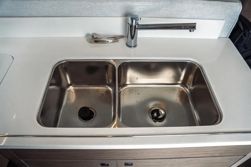 Slide: The Image of Stainless steel double sink in 2025 Jeanneau NC 1295 Coupe yacht kitchen. - 21