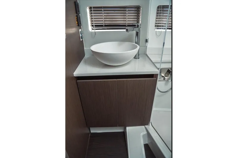 Slide: The Image of Modern bathroom interior of 2025 Jeanneau NC 1295 Coupe yacht with sleek sink design. - 37