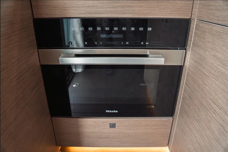 Slide: The Image of Built-in Miele oven in Jeanneau NC 1295 Coupe 2025 yacht kitchen. - 20