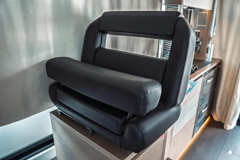 Slide: The Image of Luxury seating in the 2025 Jeanneau NC 1295 Coupe yacht interior. - 15