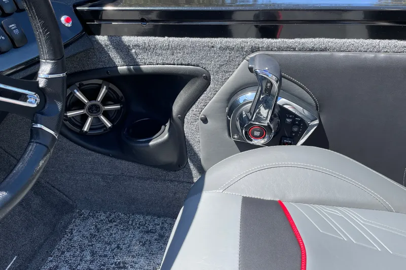 Slide: The Image of Interior of 2026 Tracker Targa V-19 Combo boat with steering wheel and controls. - 19