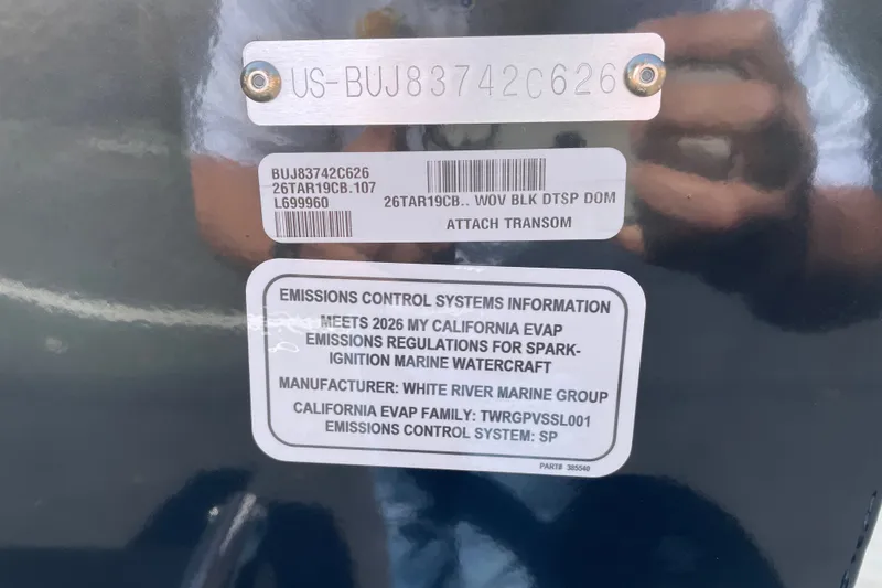 Slide: The Image of 2026 Tracker Targa V-19 Combo emissions control label on marine watercraft. - 82