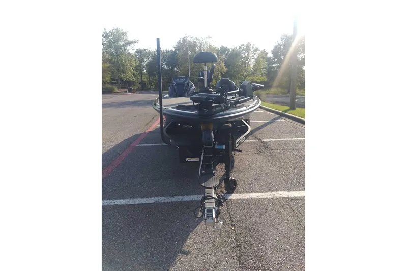Slide: The Image of 2026 Nitro Z20 XL Pro boat parked in a sunny lot. - 6