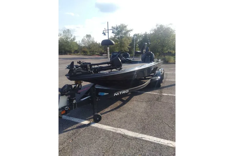 Slide: The Image of 2026 Nitro Z20 XL Pro boat on trailer in parking lot, sunny day. - 5