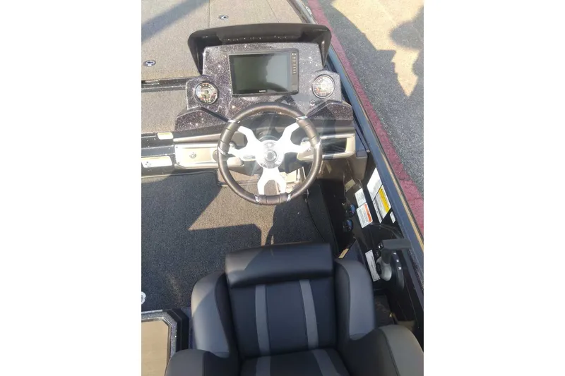 Slide: The Image of 2026 Nitro Z20 XL Pro boat cockpit with steering wheel and dashboard controls. - 9