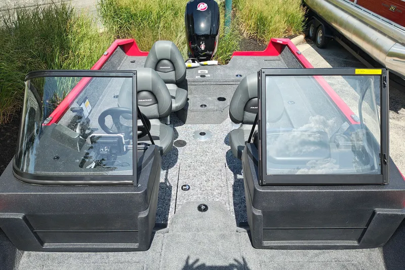 Slide: The Image of 2026 Tracker Pro Guide V-175 WT boat interior with dual consoles and seating. - 29