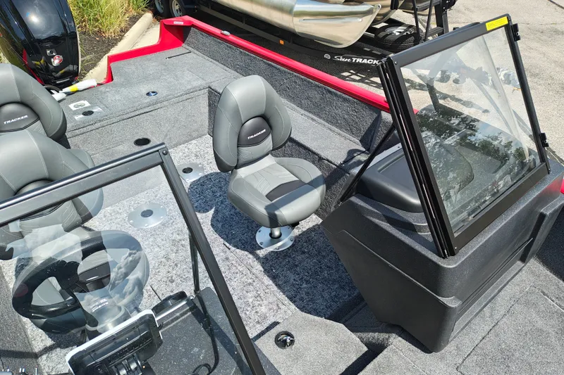 Slide: The Image of 2026 Tracker Pro Guide V-175 WT boat interior with gray seating and windshield. - 31