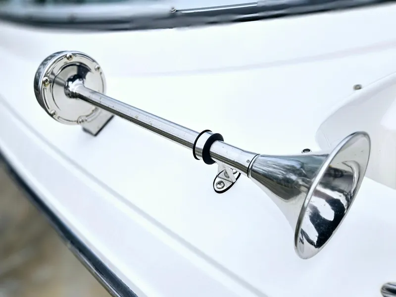 Slide: The Image of Close-up of a 2012 Monterey 244 FS boat horn, mounted on a white surface. - 20