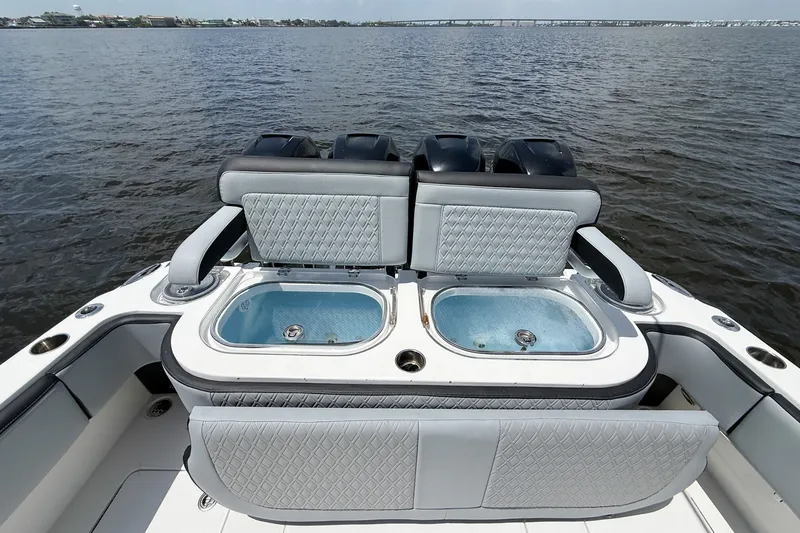 Slide: The Image of 2018 Nor-Tech 392 Super Fish boat with dual livewells on open water. - 26