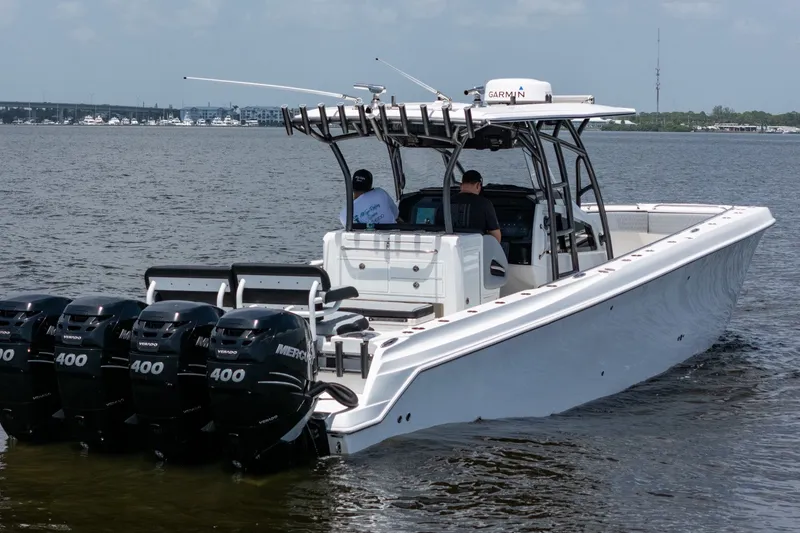 Slide: The Image of 2018 Nor-Tech 392 Super Fish boat with four Mercury 400 engines on the water. - 46