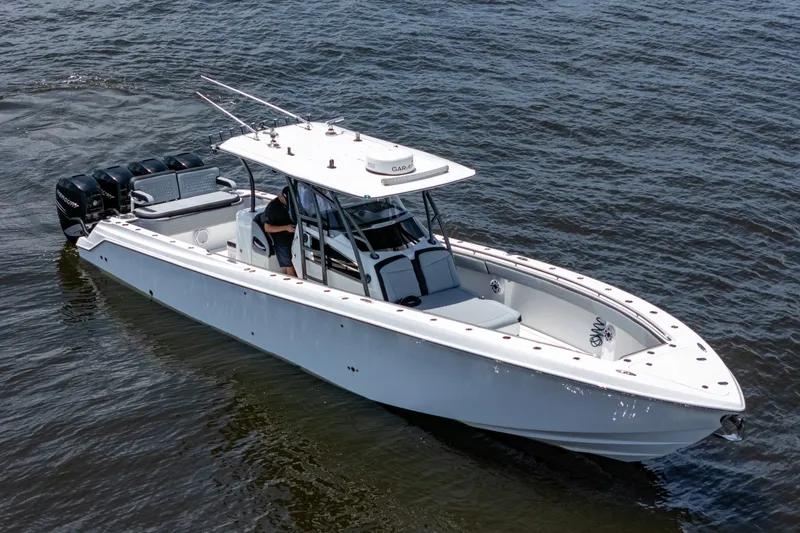 Slide: The Image of 2018 Nor-Tech 392 Super Fish boat cruising on open water. - 55