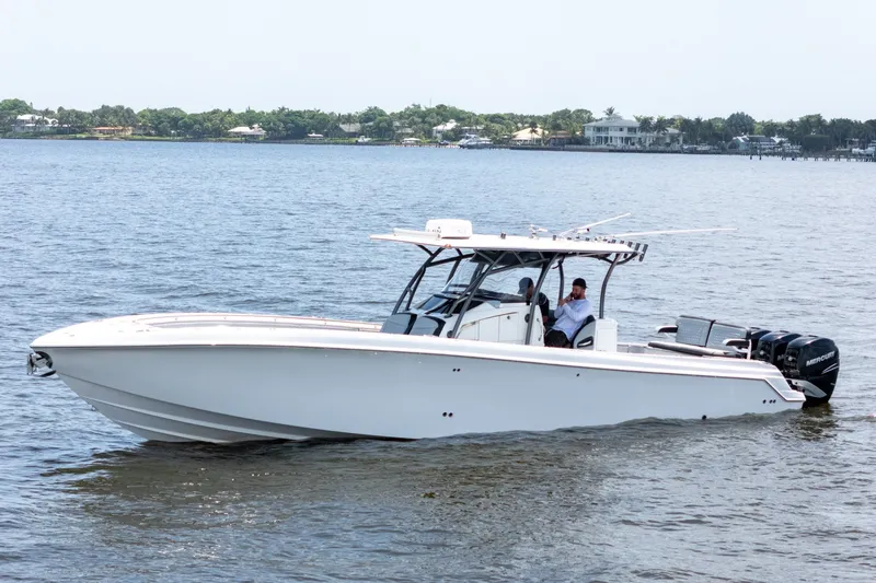 Slide: The Image of 2018 Nor-Tech 392 Super Fish boat cruising on a calm lake. - 38
