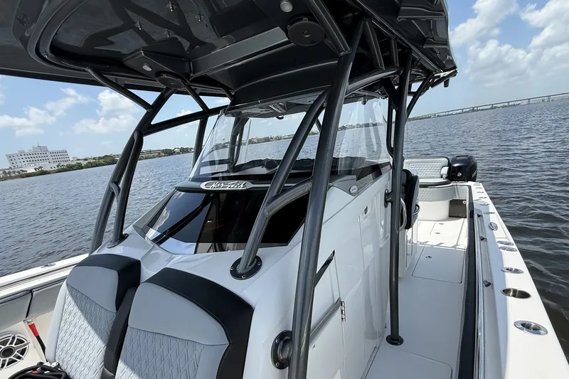 Slide: The Image of 2018 Nor-Tech 392 Super Fish boat interior with sleek design on open water. - 19