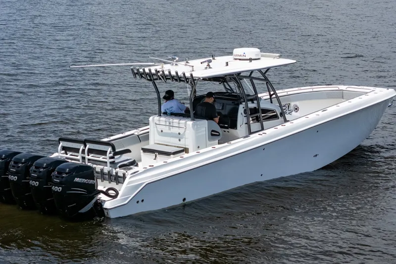 Slide: The Image of 2018 Nor-Tech 392 Super Fish boat with four Mercury engines on water. - 45