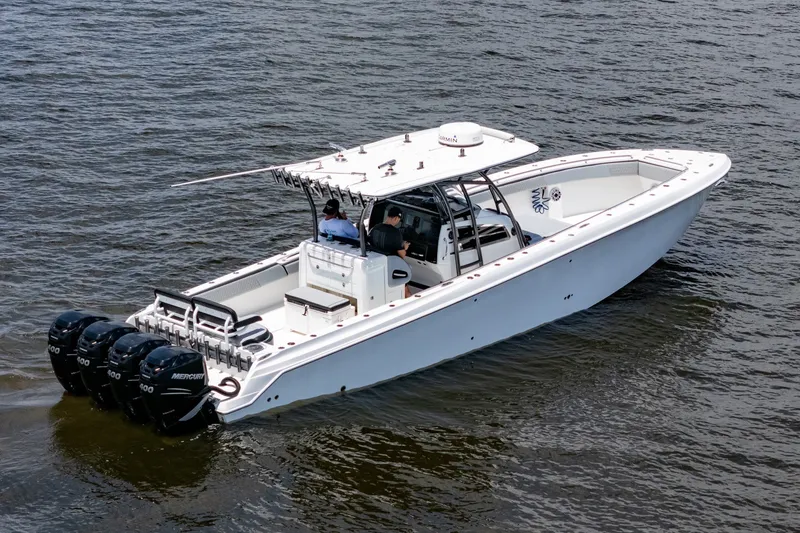 Slide: The Image of 2018 Nor-Tech 392 Super Fish boat with four Mercury engines on the water. - 44