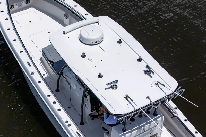 Slide: The Image of 2018 Nor-Tech 392 Super Fish boat with Garmin equipment on water. - 52
