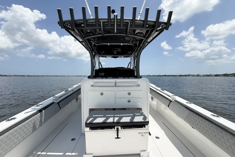 Slide: The Image of 2018 Nor-Tech 392 Super Fish boat interior with rod holders, open water view. - 5