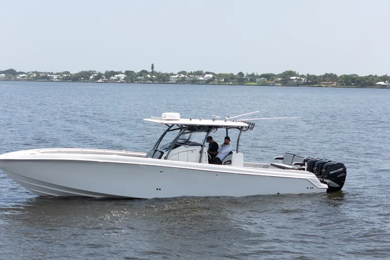 Slide: The Image of 2018 Nor-Tech 392 Super Fish boat cruising on calm waters. - 37