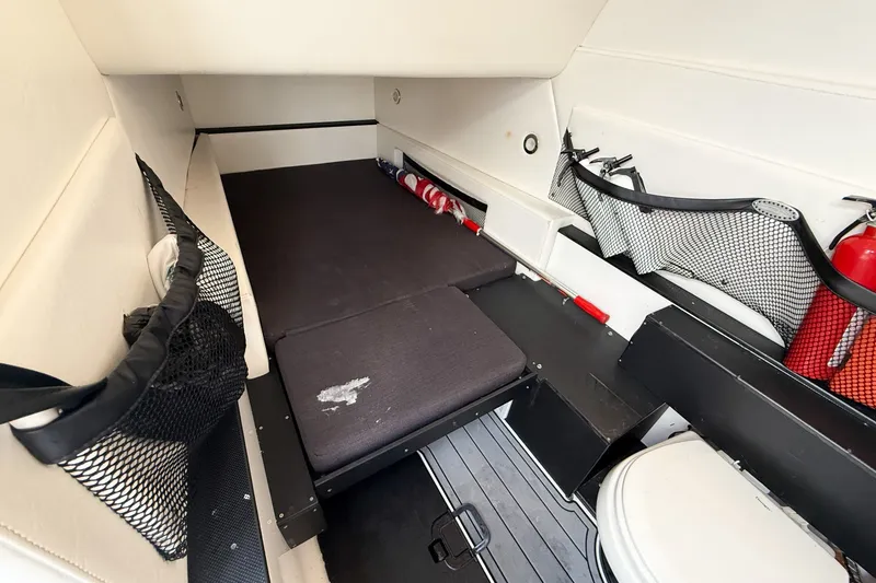 Slide: The Image of 2018 Nor-Tech 392 Super Fish cabin interior with storage nets and fire extinguisher. - 32