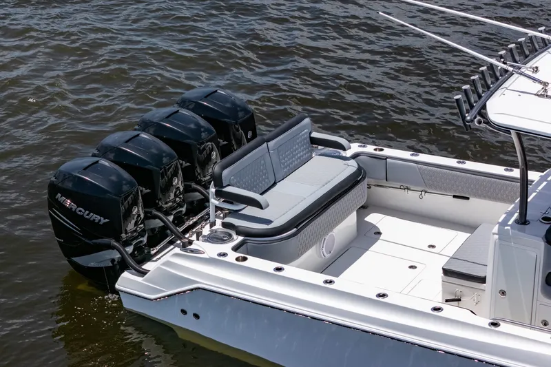 Slide: The Image of 2018 Nor-Tech 392 Super Fish boat with four Mercury outboard engines on water. - 50