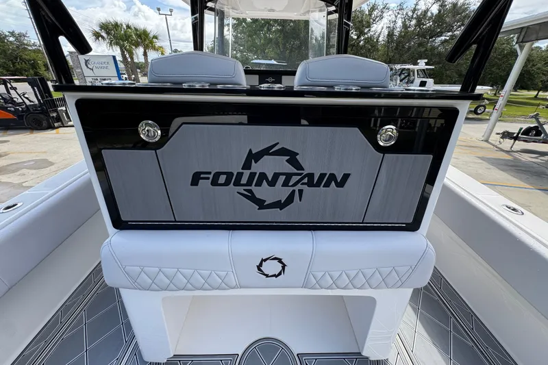 Slide: The Image of 2024 Fountain 34 Center Console boat interior with logo and seating. - 40