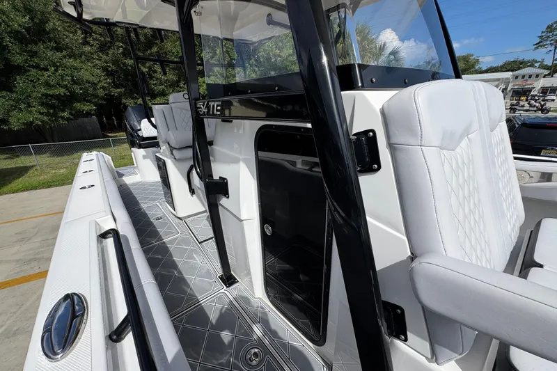 Slide: The Image of 2024 Fountain 34 Center Console boat interior with sleek seating and modern design. - 28