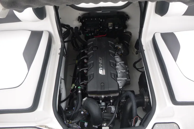 Slide: The Image of Engine compartment of a 2026 Yamaha Boats AR195, showcasing the powerful engine setup. - 15