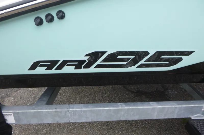 Slide: The Image of 2026 Yamaha Boats AR195 logo on boat hull, close-up view. - 16