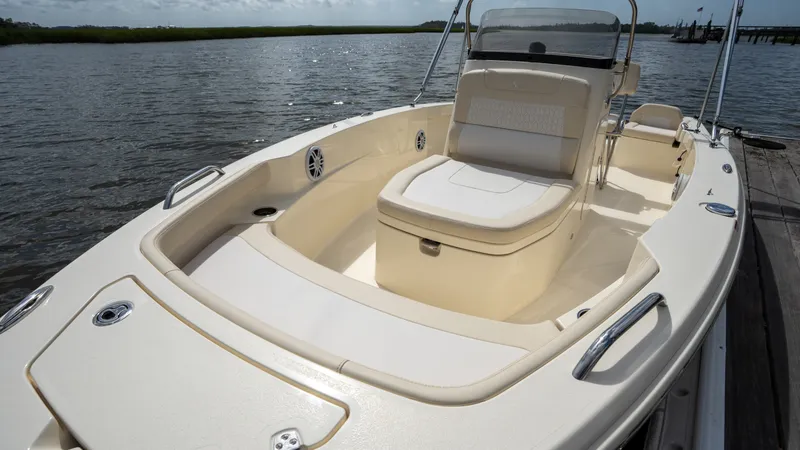 Slide: The Image of Scout 188 Sportfish 2027 with spacious deck and comfortable seating by the water. - 5