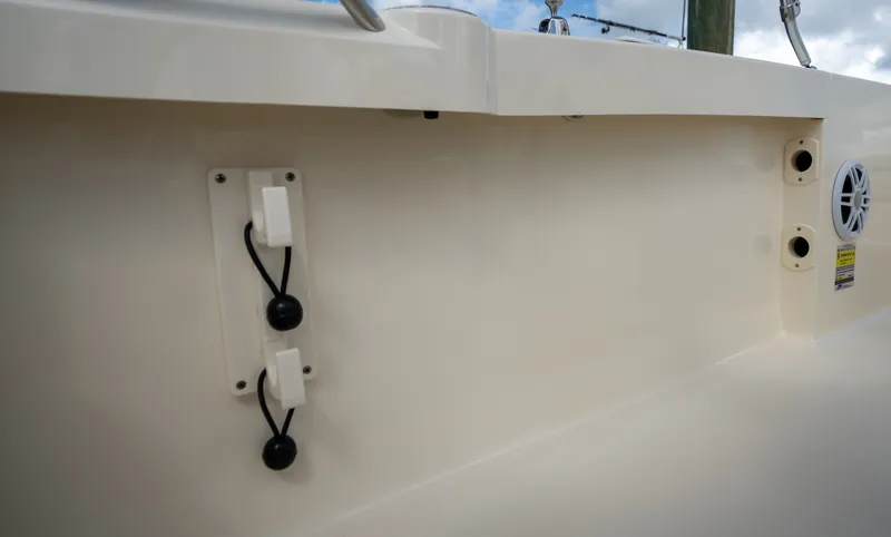 Slide: The Image of Scout 188 Sportfish 2027: Close-up of boat deck with mounts and speaker. - 15