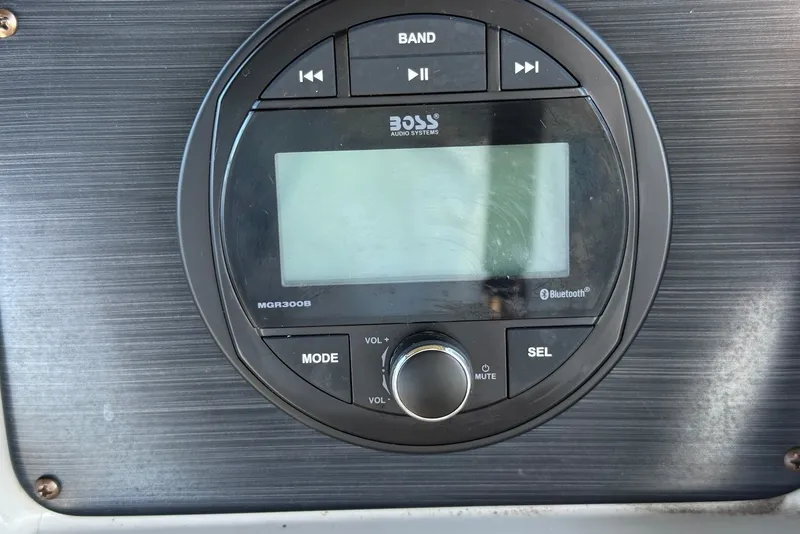 Slide: The Image of Boss audio system on 2020 Sylvan Mirage 822 LZ boat dashboard. - 20