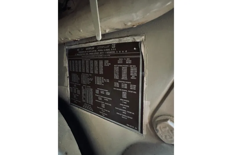 Slide: The Image of Engine information plate on a 1996 Sabreline 36 Sedan, featuring patent details. - 65