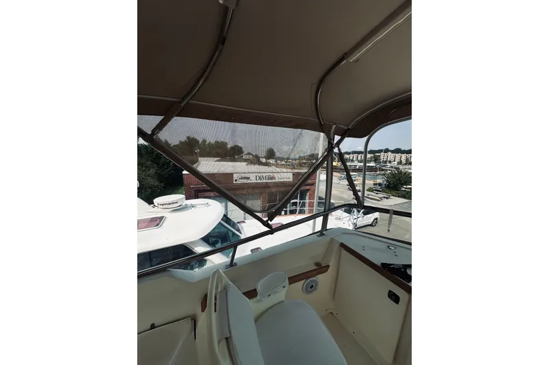 Slide: The Image of 1996 Sabreline 36 Sedan boat interior with marina view. - 102