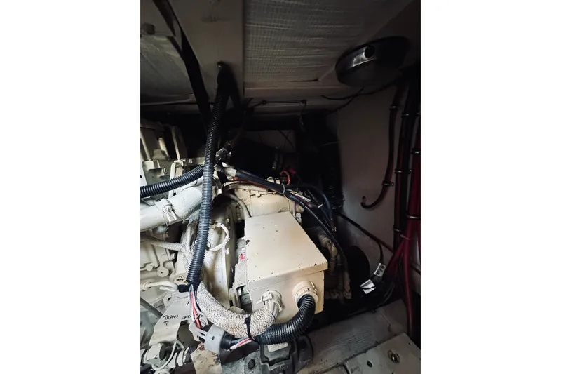 Slide: The Image of Engine room of a 1996 Sabreline 36 Sedan with visible wiring and components. - 70