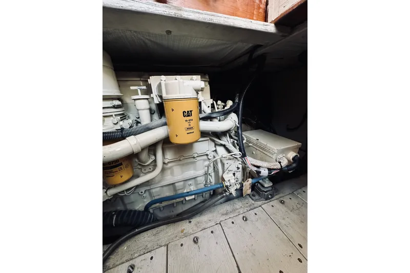 Slide: The Image of Engine compartment of a 1996 Sabreline 36 Sedan with CAT components visible. - 69