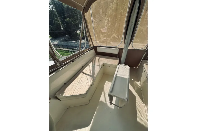 Slide: The Image of 1996 Sabreline 36 Sedan interior with seating and windows, showcasing spacious design. - 96