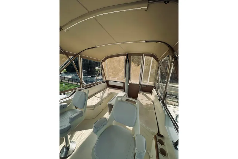 Slide: The Image of 1996 Sabreline 36 Sedan interior with seating and panoramic windows. - 89