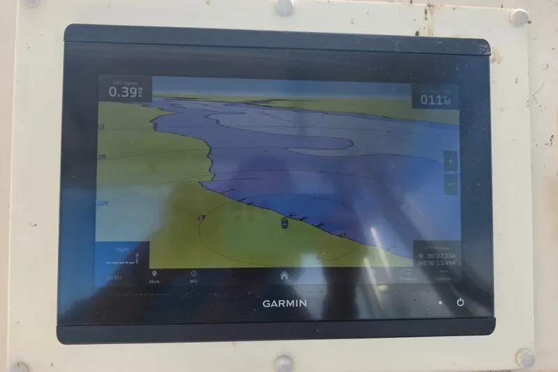 Slide: The Image of Garmin GPS display on 2008 Grady White 282 Sailfish, showing nautical navigation map. - 18