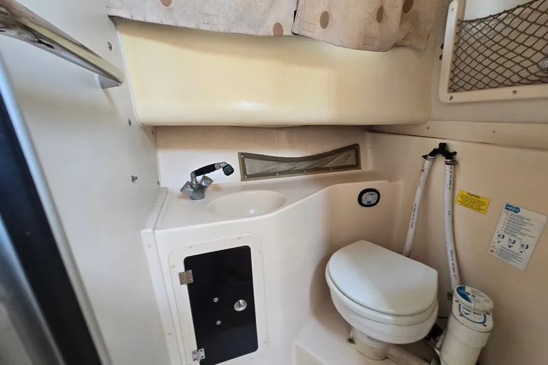 Slide: The Image of 2008 Grady White 282 Sailfish boat bathroom with sink and toilet. - 30