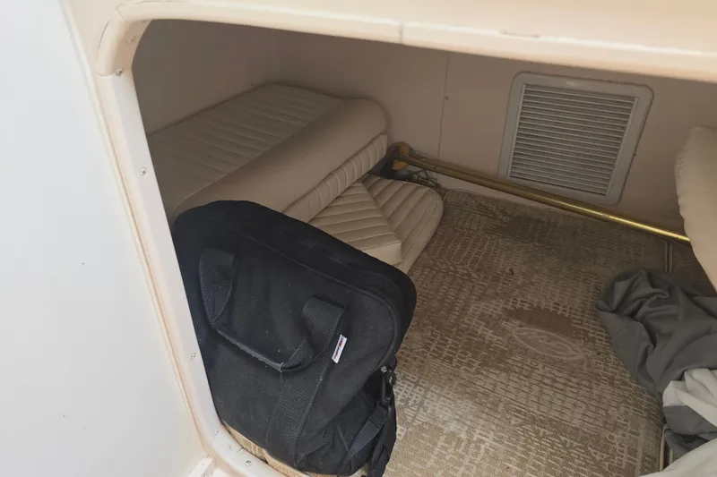 Slide: The Image of Interior cabin of 2008 Grady White 282 Sailfish with seating and storage. - 31