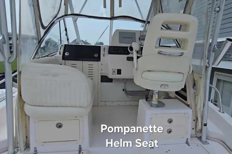 Slide: The Image of 2008 Grady White 282 Sailfish helm with Pompanette seat and Garmin navigation. - 15