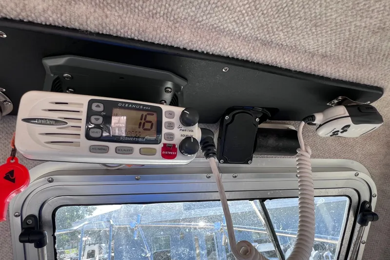 Slide: The Image of Boat cabin interior with Uniden marine radio, Parker 2320 SL Sport Cabin, 2012 model. - 34