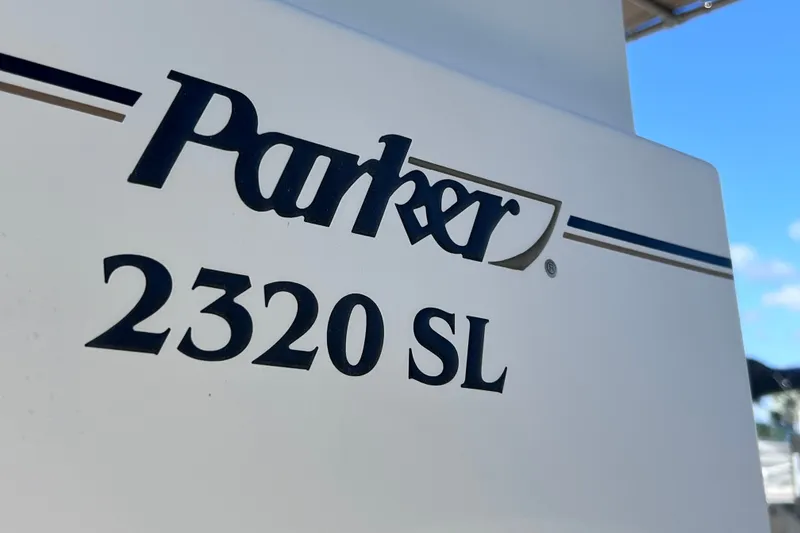 Slide: The Image of Close-up of Parker 2320 SL Sport Cabin boat logo, 2012 model. - 3