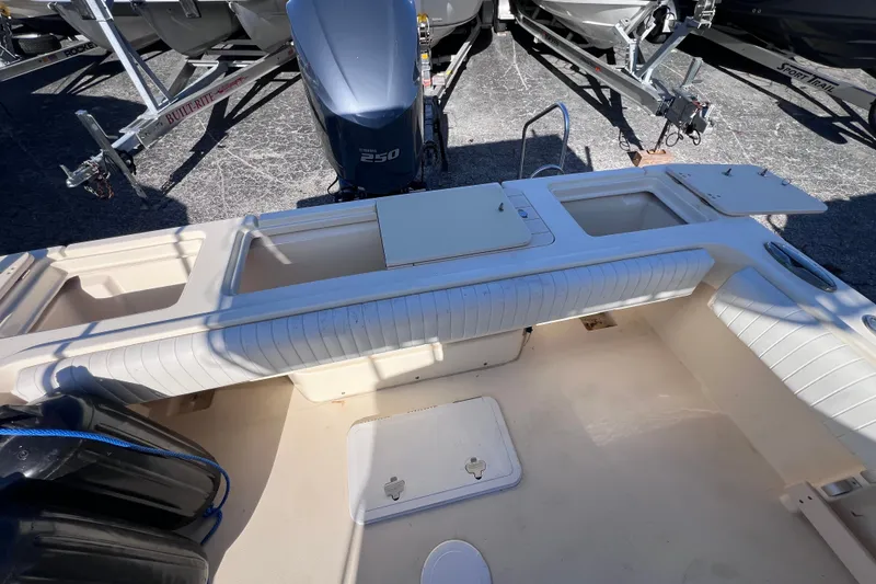 Slide: The Image of 2012 Parker 2320 SL Sport Cabin boat interior with Yamaha 250 engine. - 14