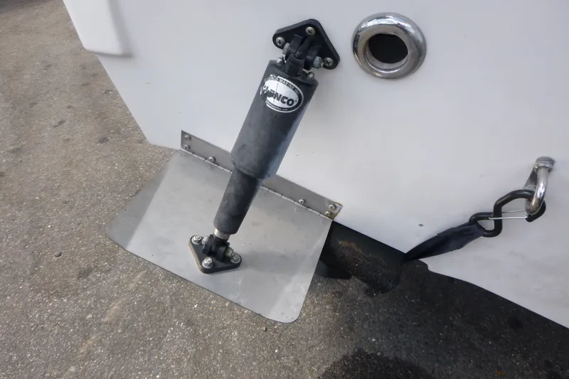 Slide: The Image of 2010 Trophy 2152 Walkaround boat trim tab and hydraulic actuator detail. - 15