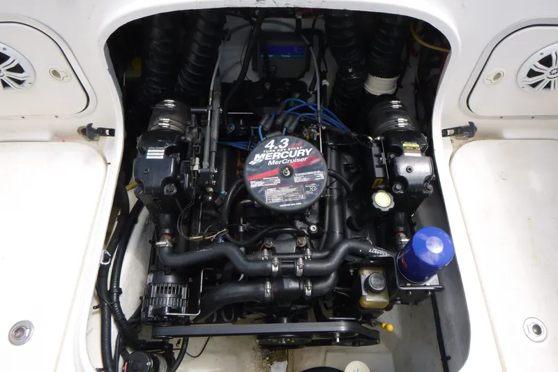 Slide: The Image of Engine compartment of a 2010 Trophy 2152 Walkaround boat with Mercury 4.3L engine. - 13